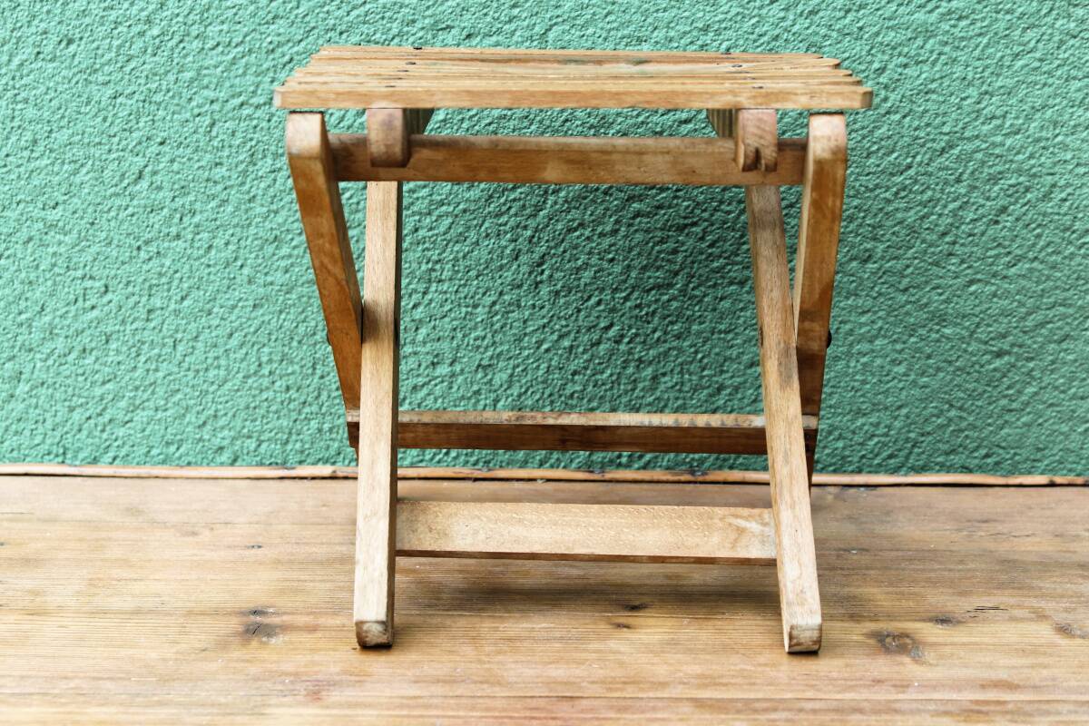 Folding slatted wood stool