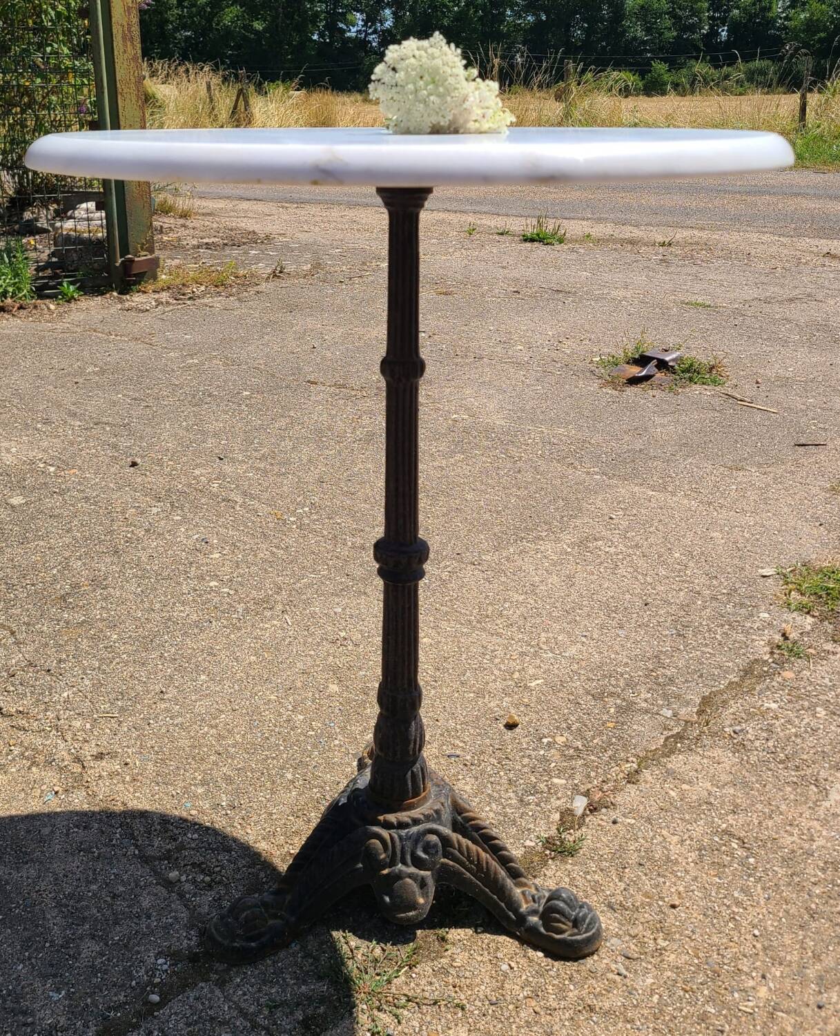Parisian bistro pedestal table in marble and cast iron