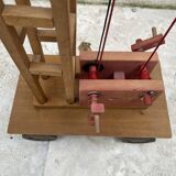 Vintage wooden crane toy from the 60s