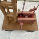Vintage wooden crane toy from the 60s