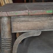 Rustic Thonet table in brown beech, circa 1920, with slatted top and turned legs.