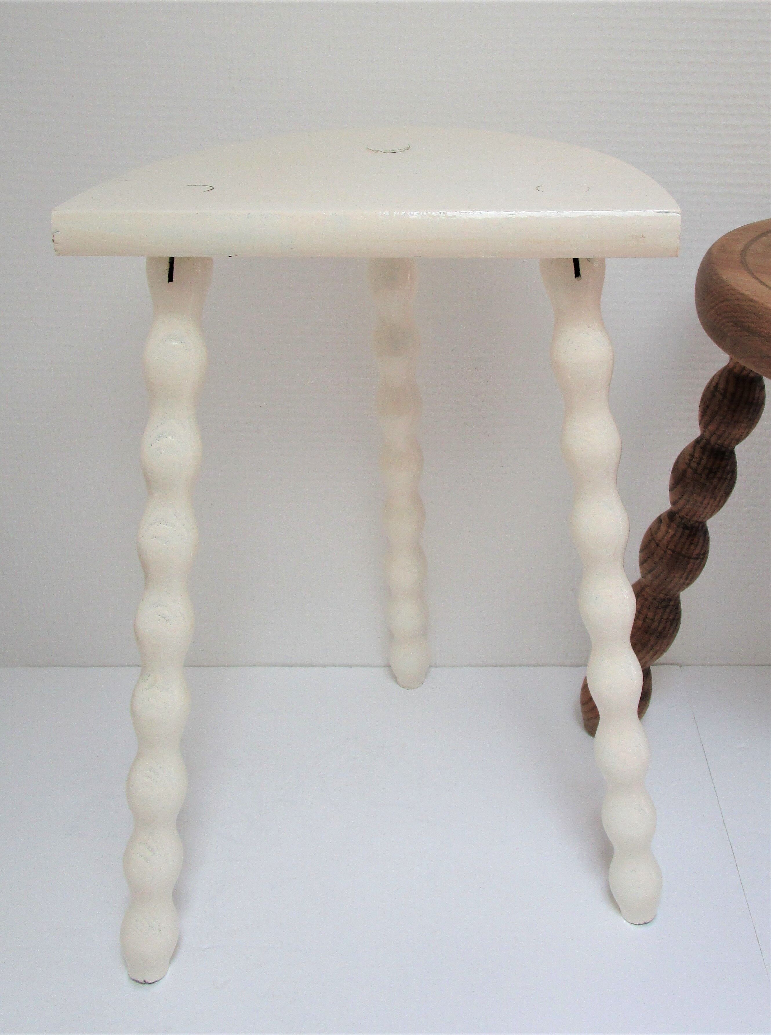 Two vintage tripod solid wood stools