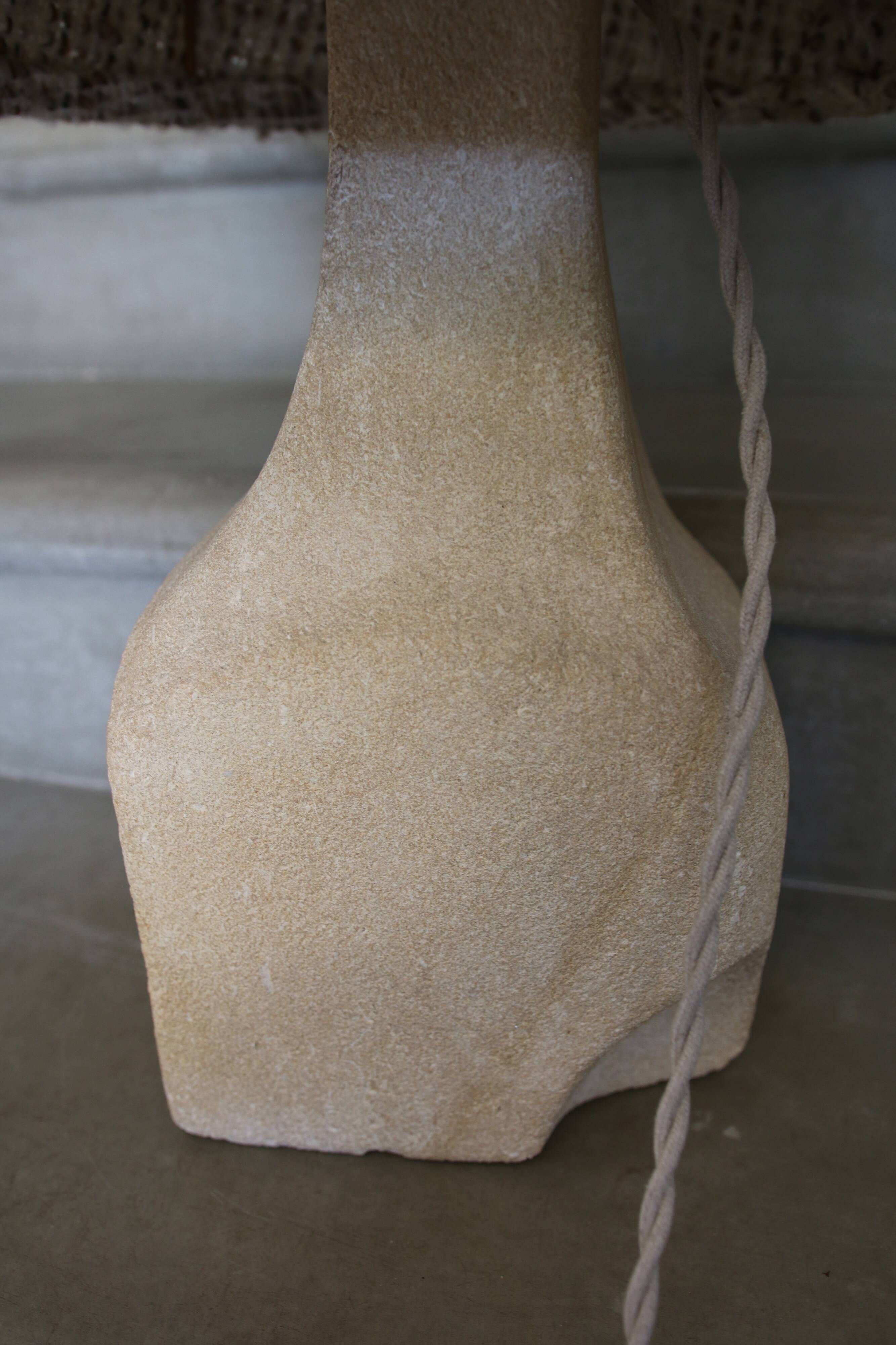 Large sculpted stone lamp, in the style of Albert Tormos, 1970s.