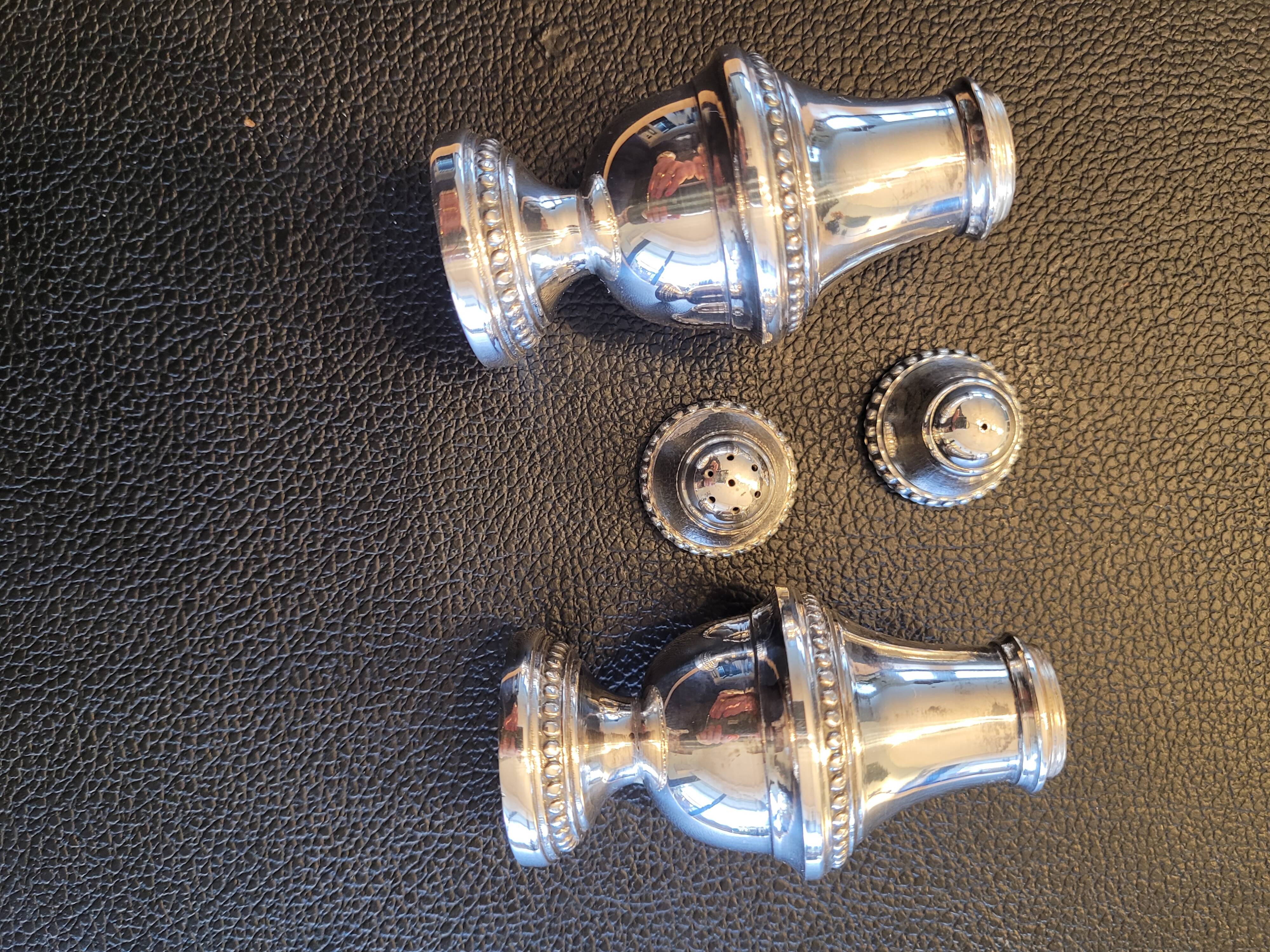 Silver salt and pepper shakers