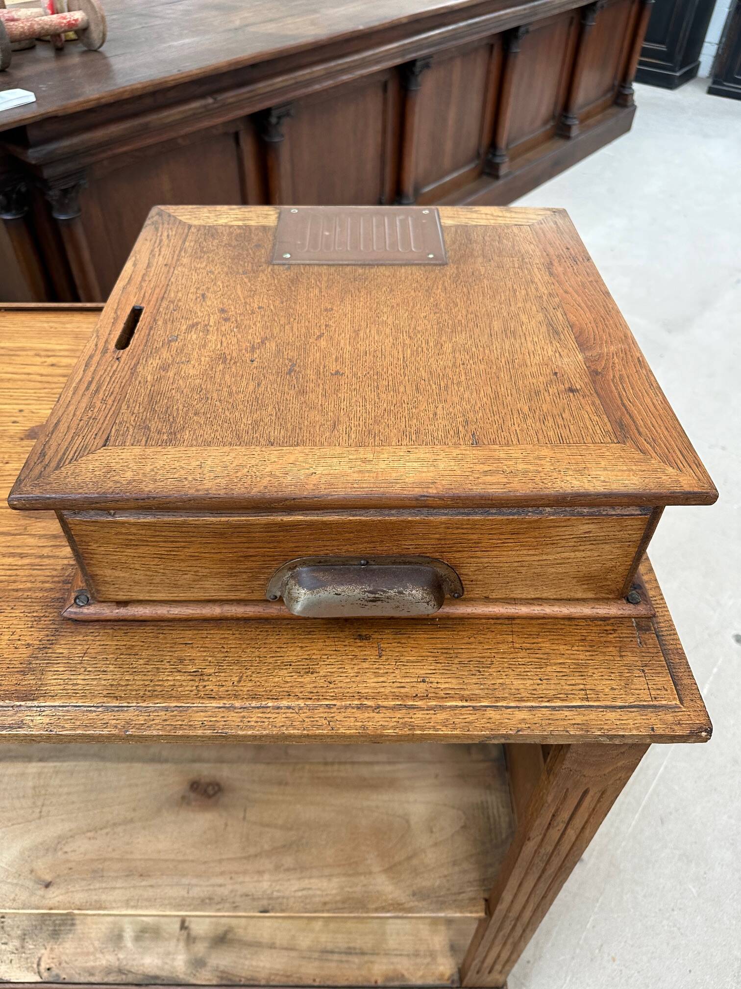 Oak cash register counter from the early 20th century