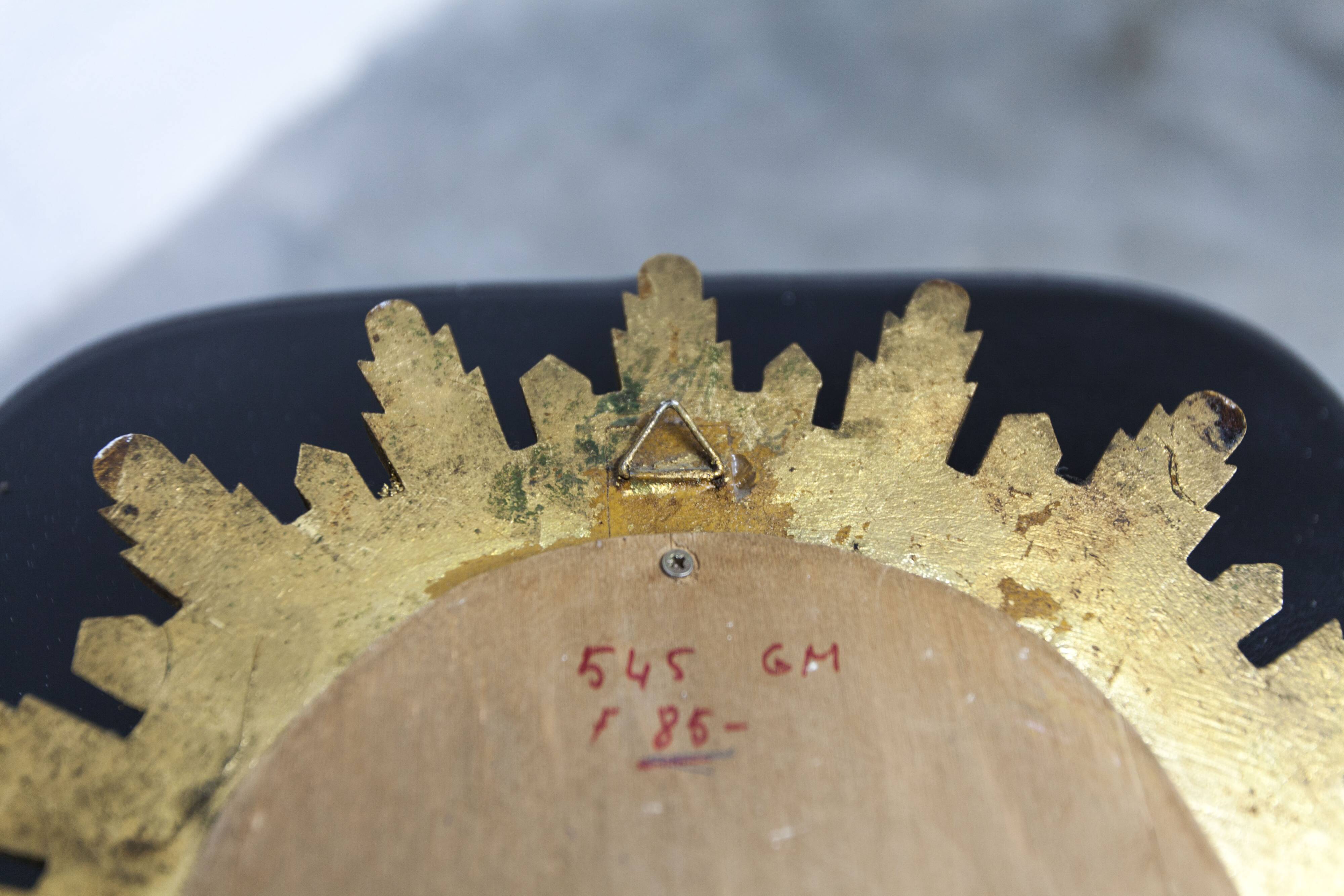 Vintage 1970s convex witch's eye sunburst mirror