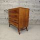 Vintage chest of drawers with tapered legs