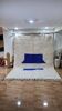 Minimalist Berber wool rug, clean design with blue patterns