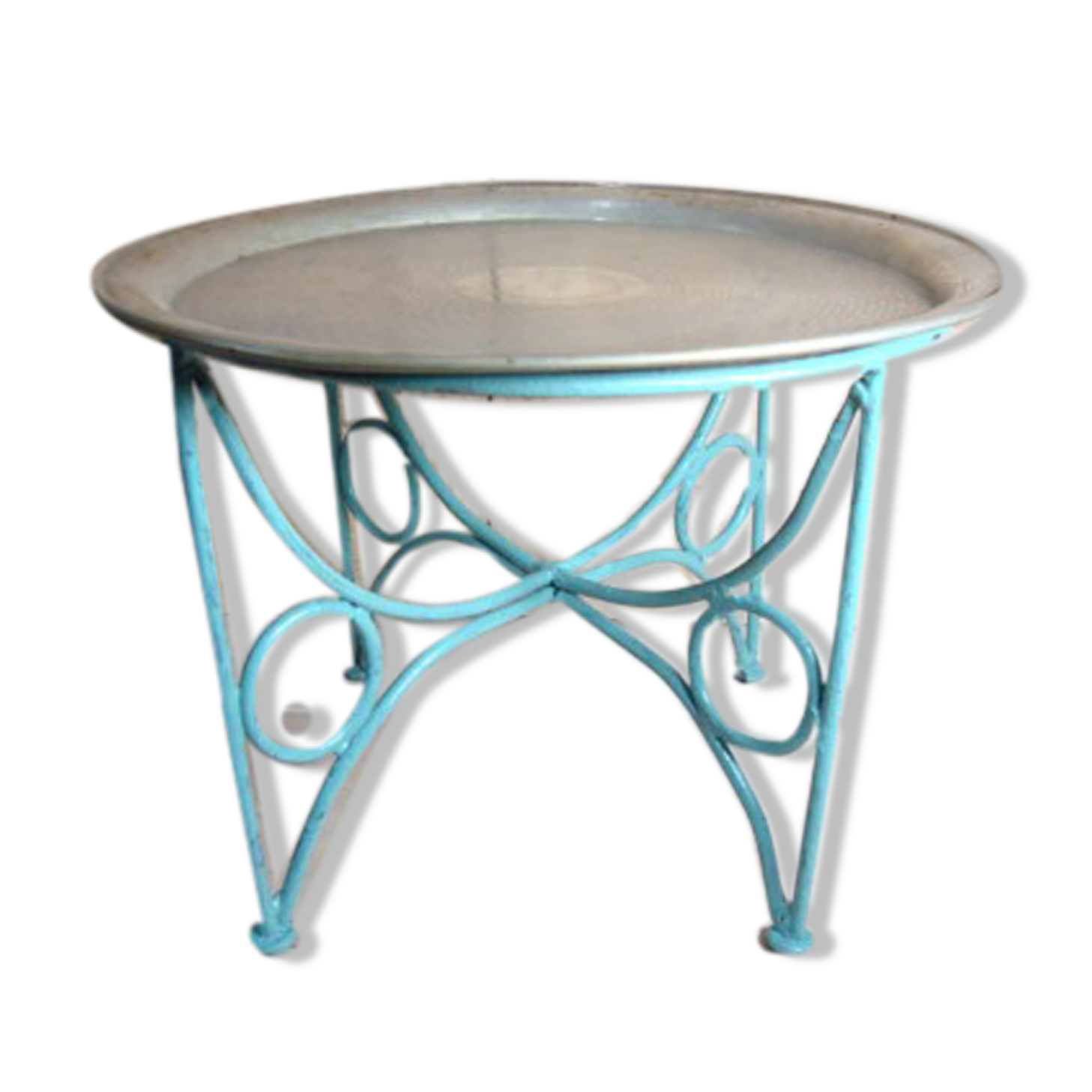 Small metal coffee table or plant stand.