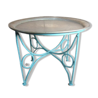 Small metal coffee table or plant stand.