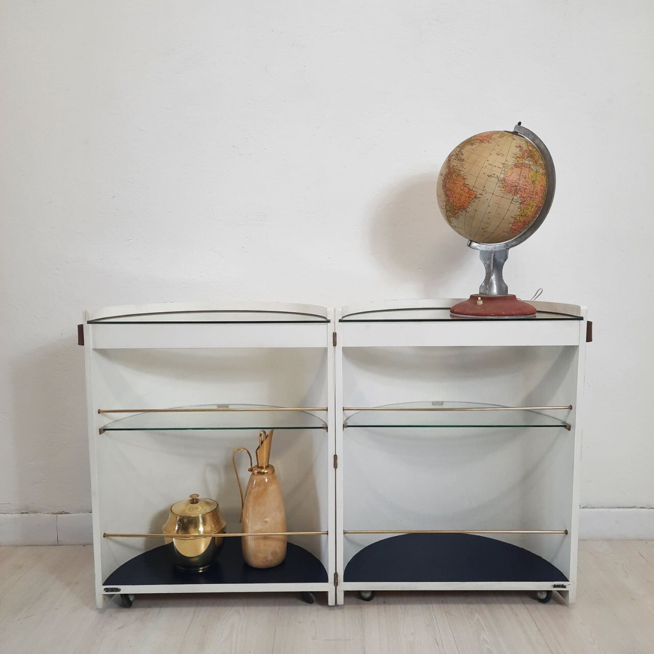 Vintage openable cylinder shaped bar cabinet, wood, brass and glass.