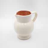 White pitcher in glazed stoneware