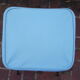 Vintage stool with tapered legs in sky blue faux leather.