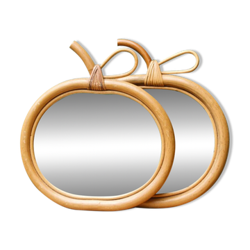 Pair of rattan apple mirrors