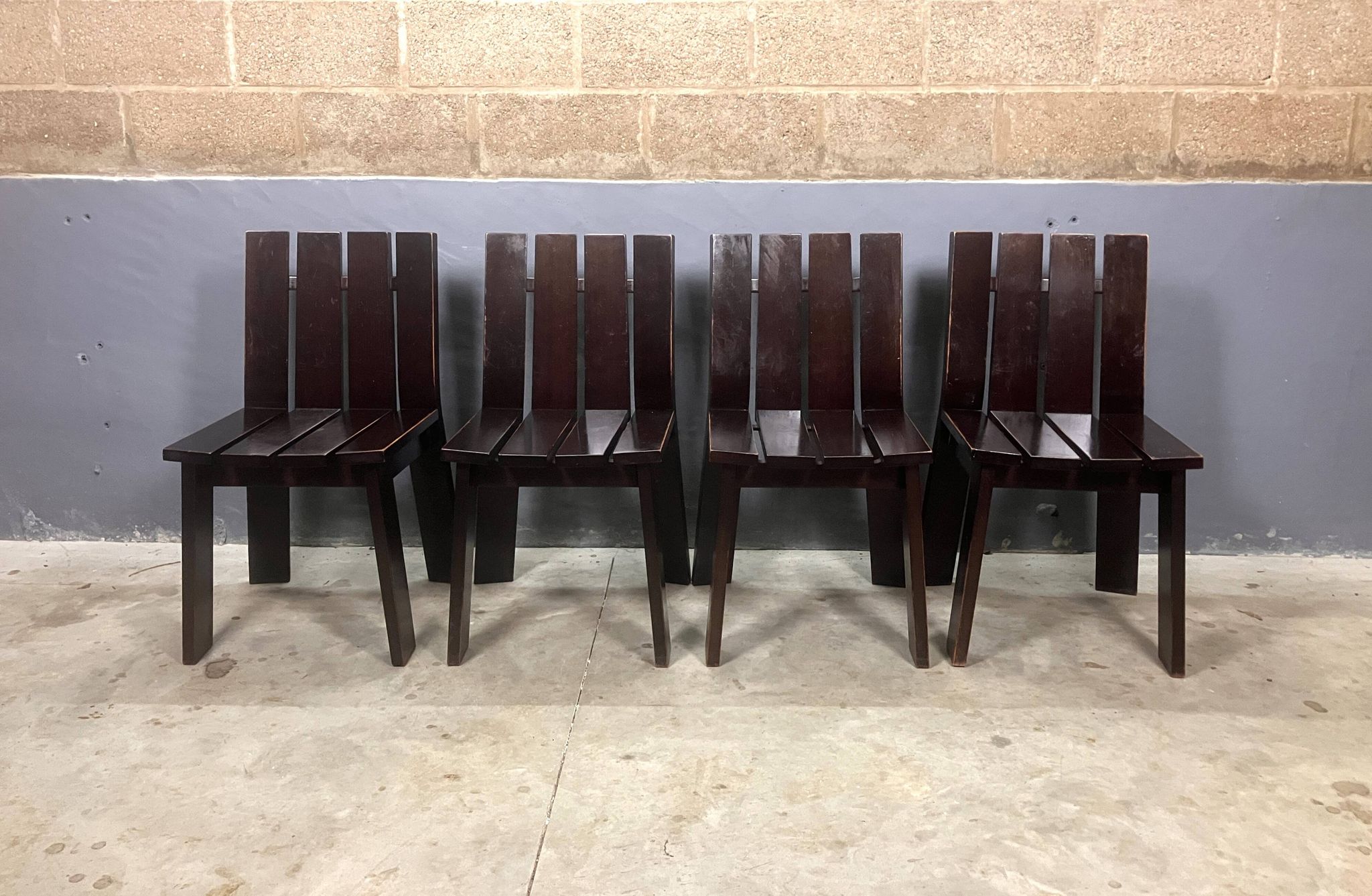 Brutalist and modernist dining chairs from the 1970s in architectural brown wood.