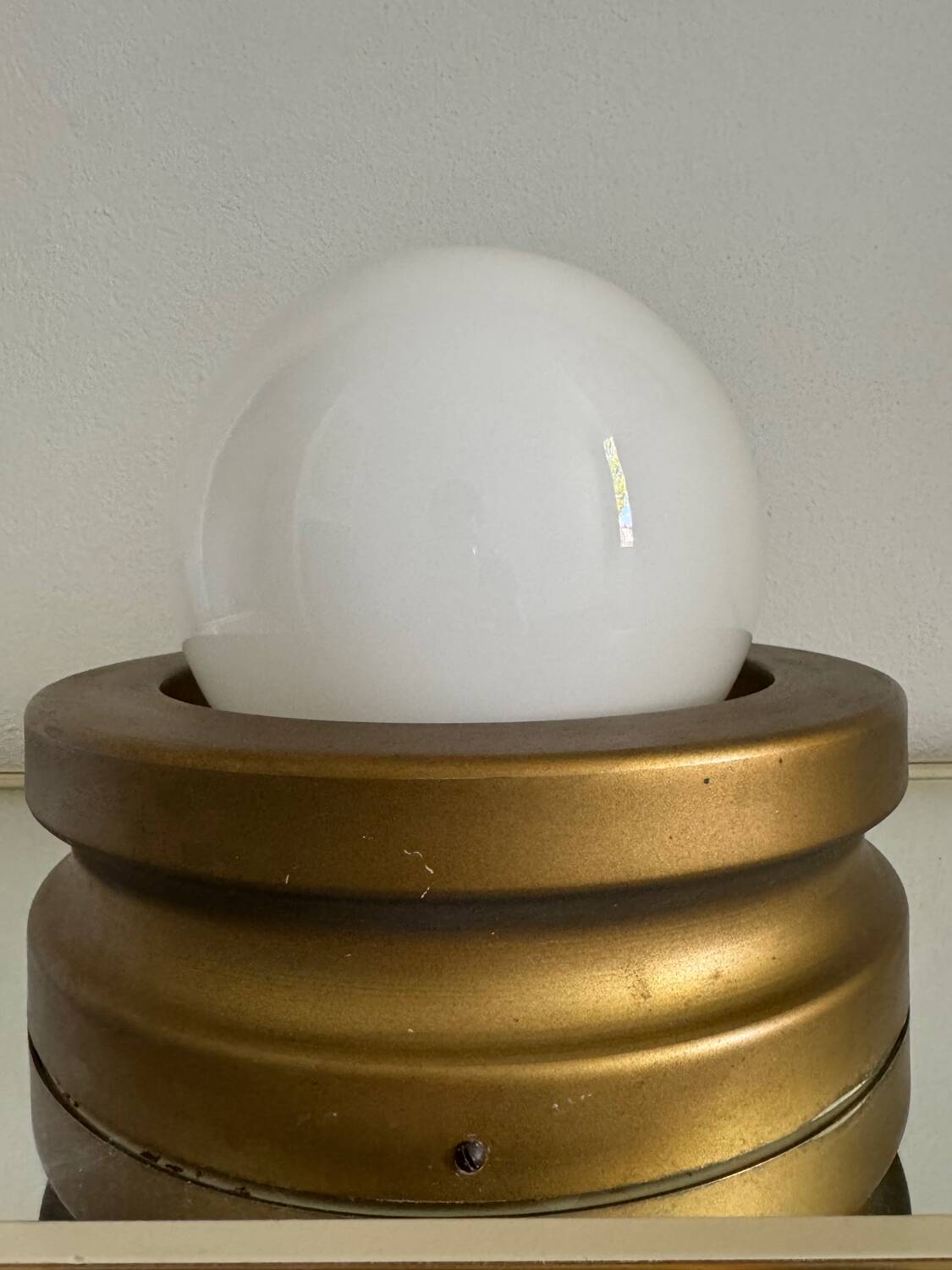 Opaline ball lamp with gold base from the 70s