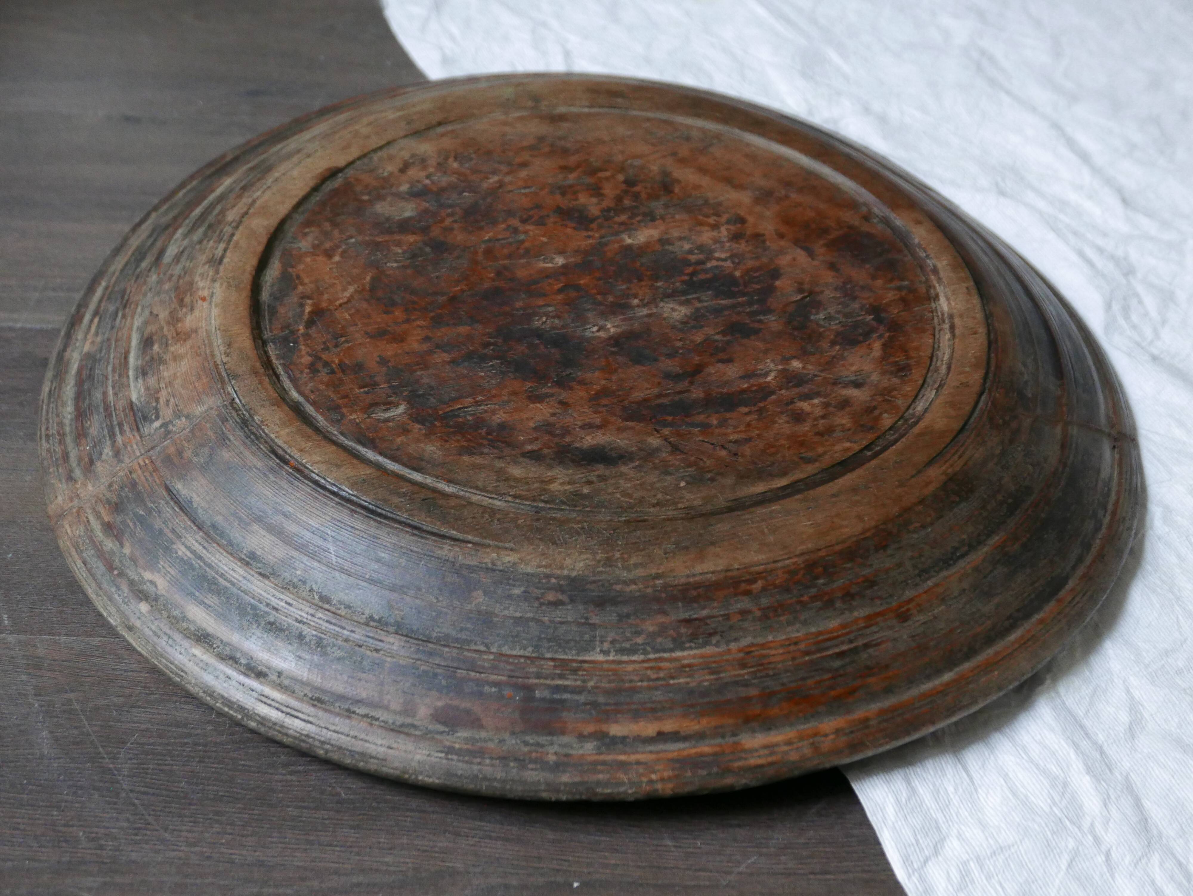 Old round wooden tray