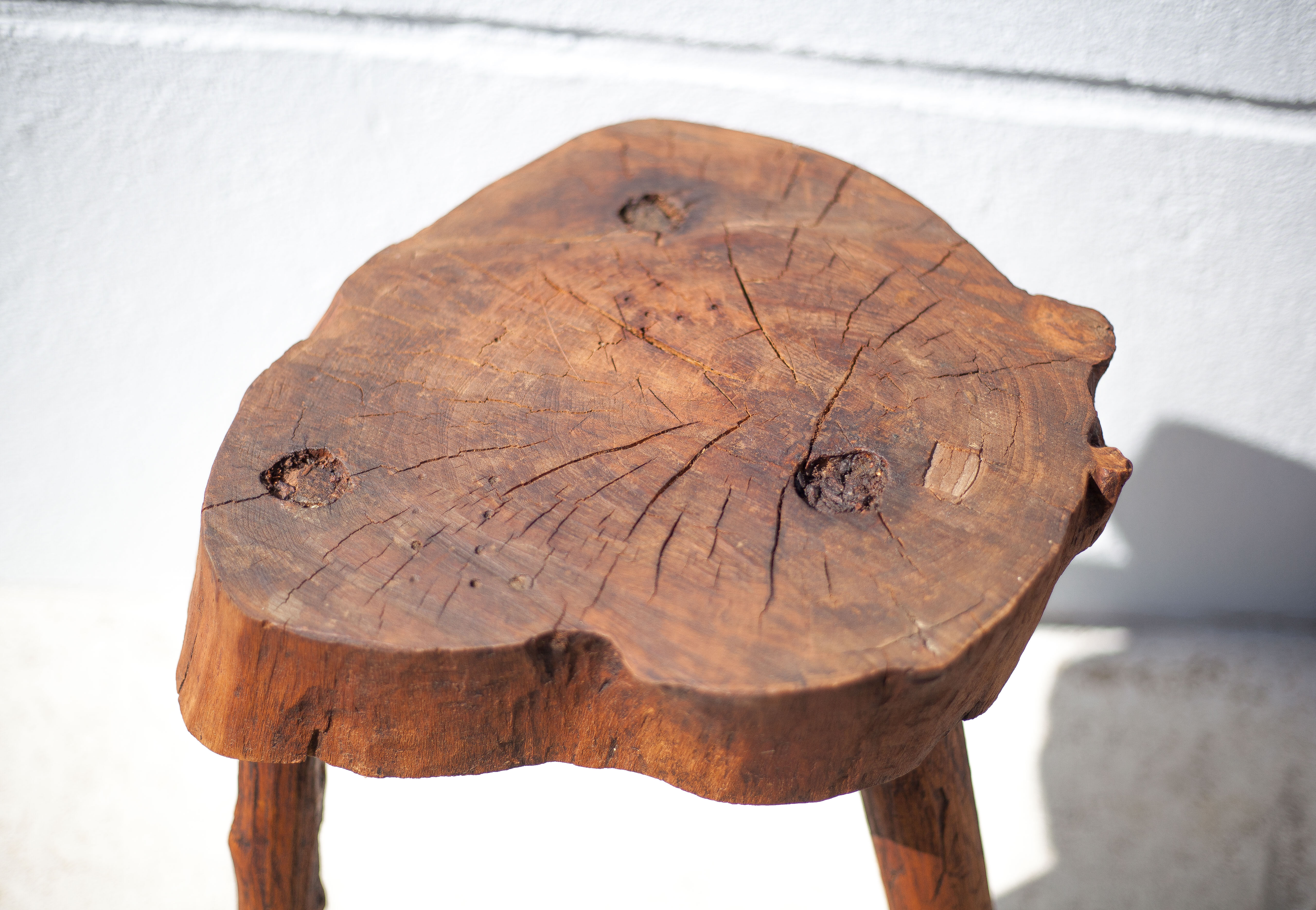 Pair of brutalist tripod wood stools