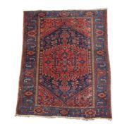 Antique hand-knotted oriental rug with predominantly red, purple, and blue colors 182x136cm