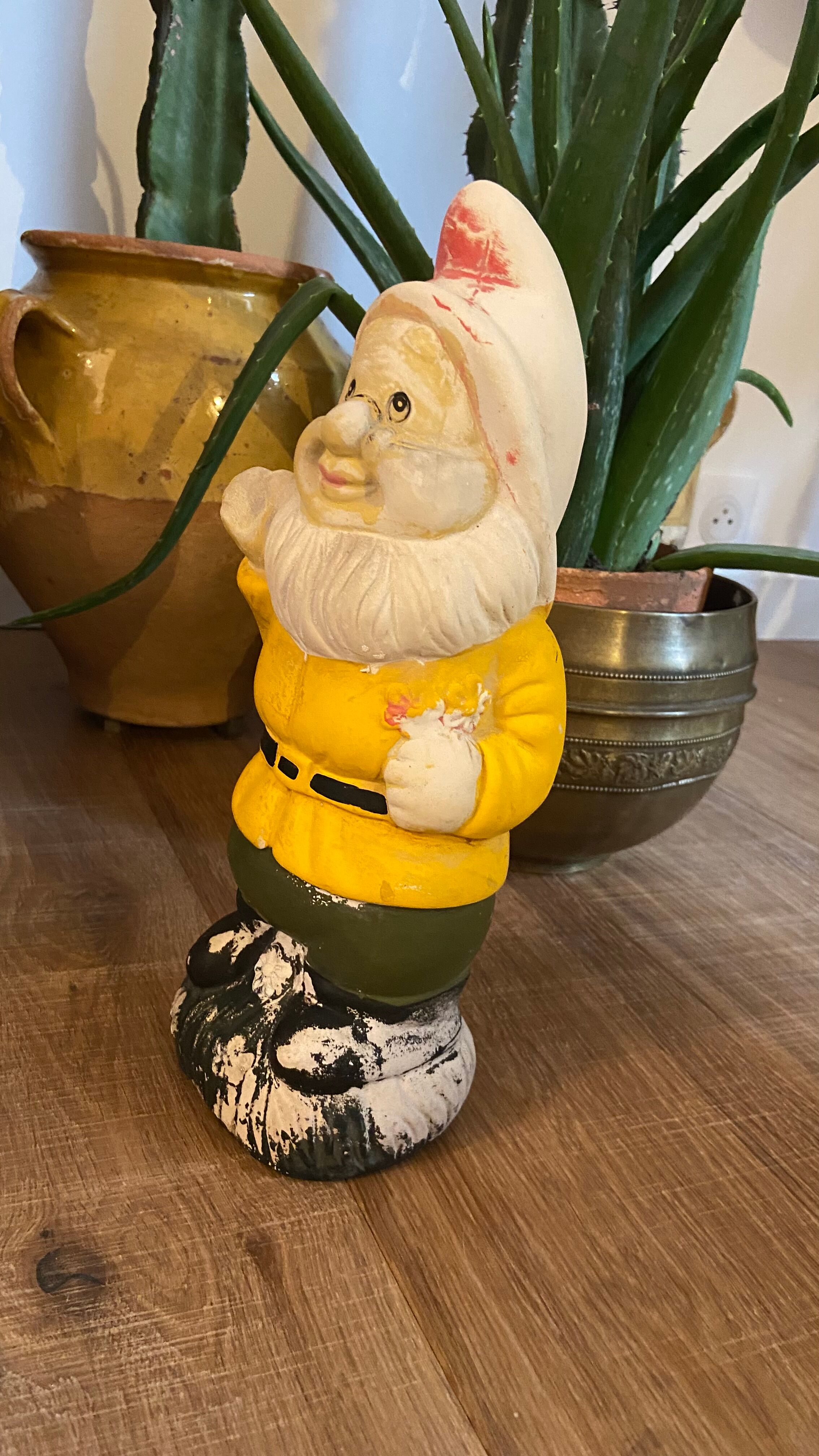 Ancient terracotta garden gnome