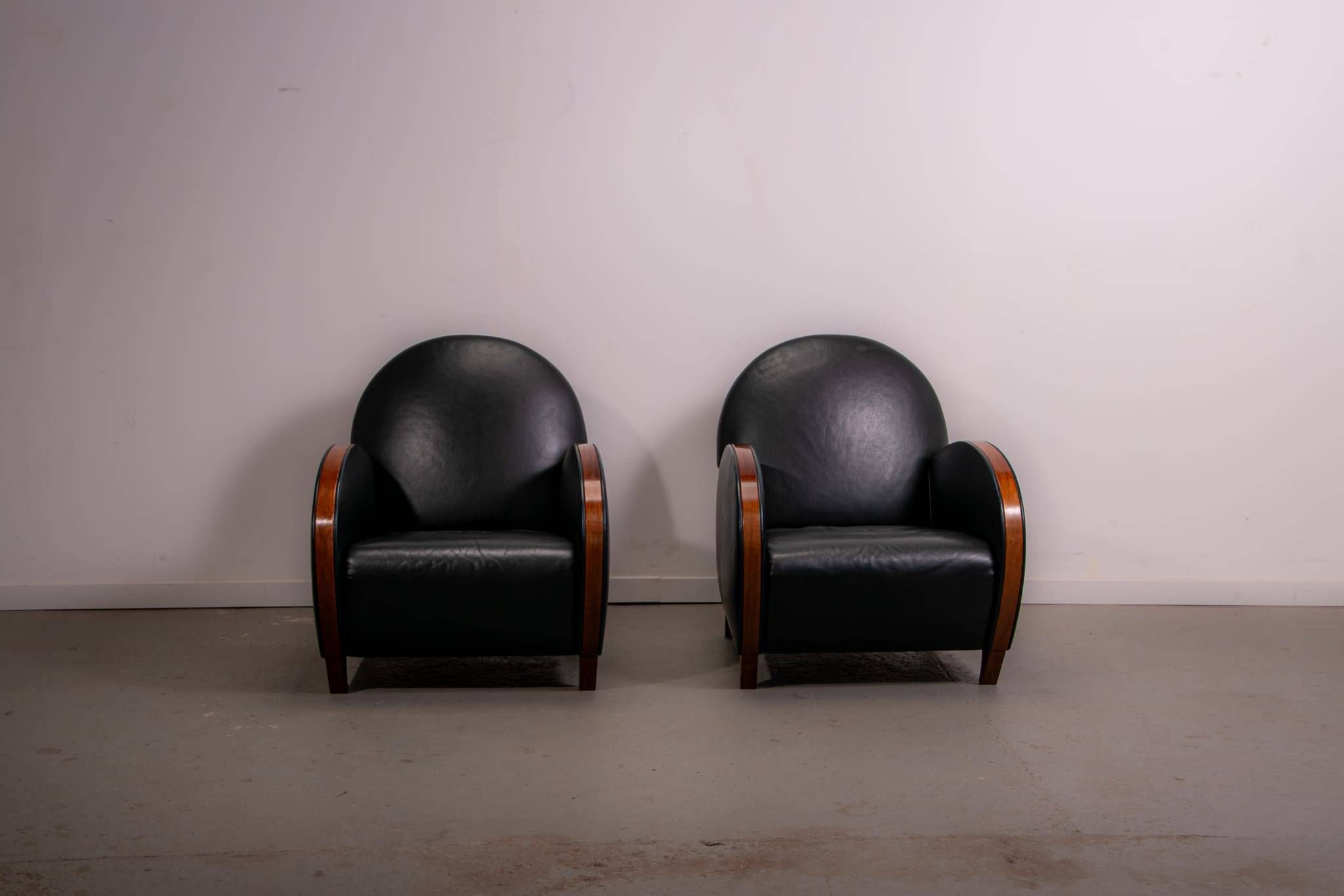 Pair of mid-century leather armchairs, circa 1970, made in Belgium.