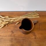 Enameled stoneware pitcher by Jean Dubost