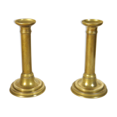 Paire de chandeliers à poussoir en laiton