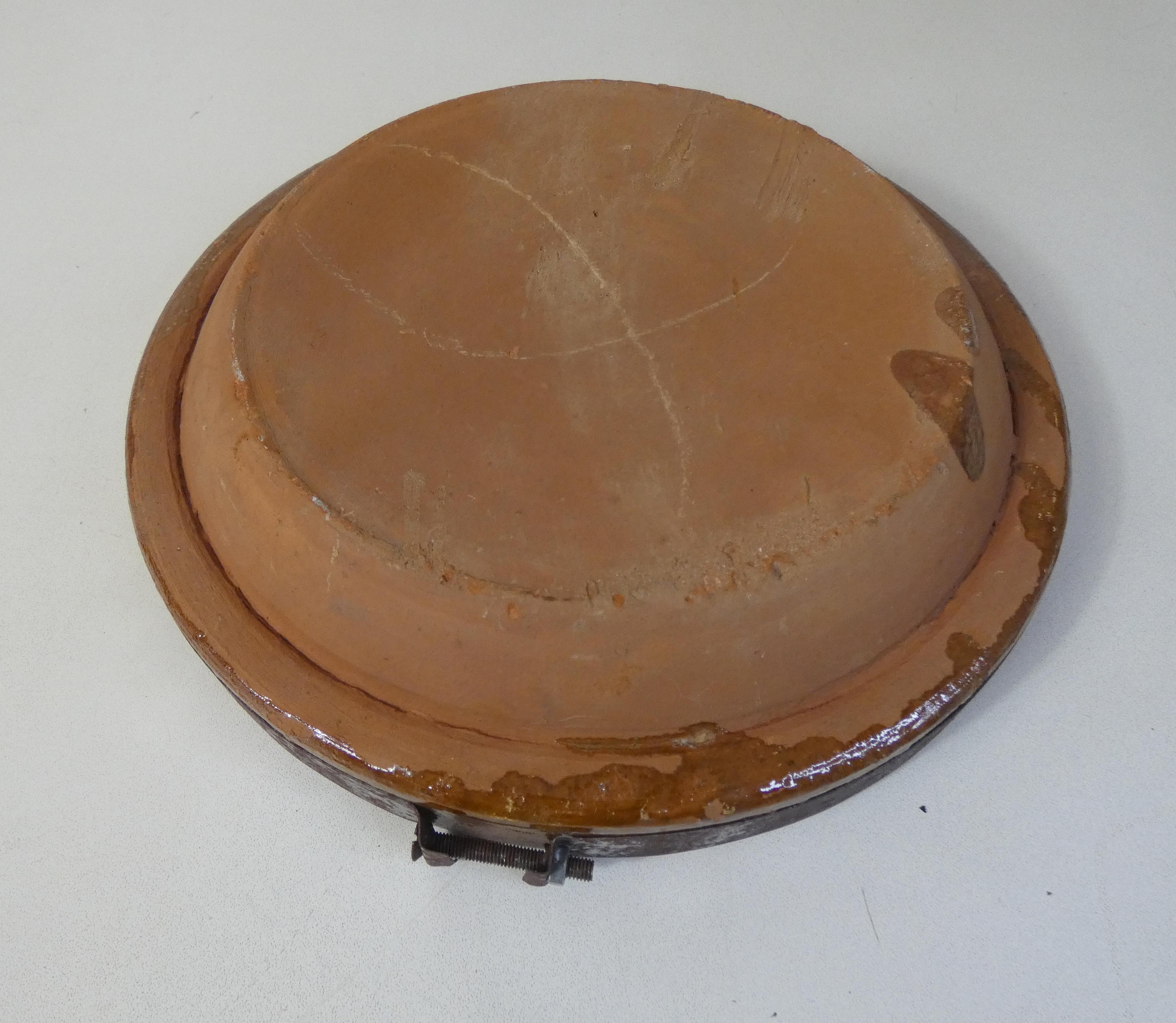 Old glazed terracotta tagine