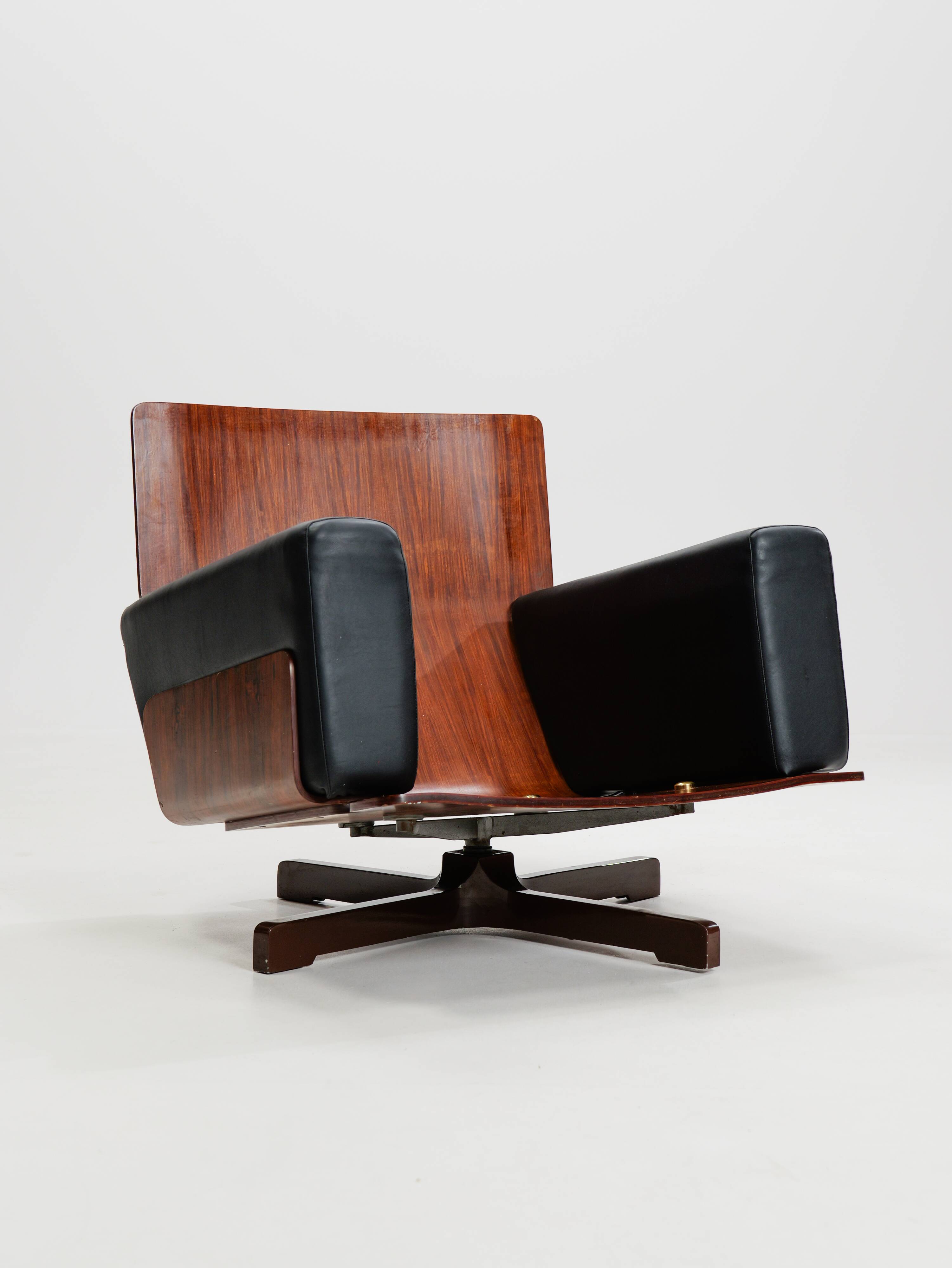 Swivel rosewood model 401 armchair by Menilio Taro for Cinova, 1960s