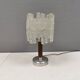 Table lamp with a teak ‘trunk’, silver-coloured metal base, acrylic shade
