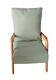 Free span armchair in the style of Pierre Guariche.