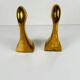 Pair of brass bookends in the shape of a duck's head, 1970.