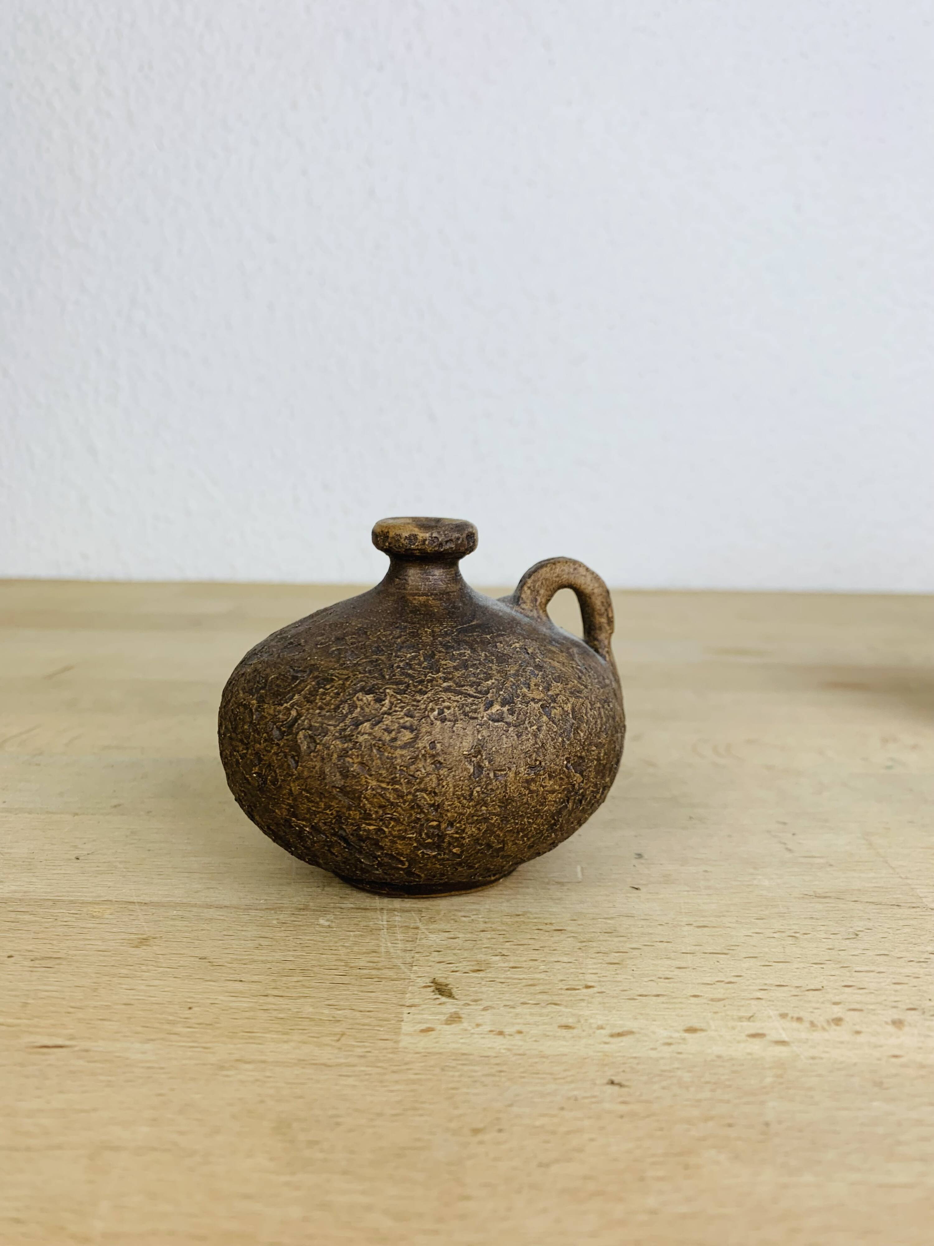 Trio of vintage stoneware vases