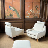 Paire de fauteuils et repose pied