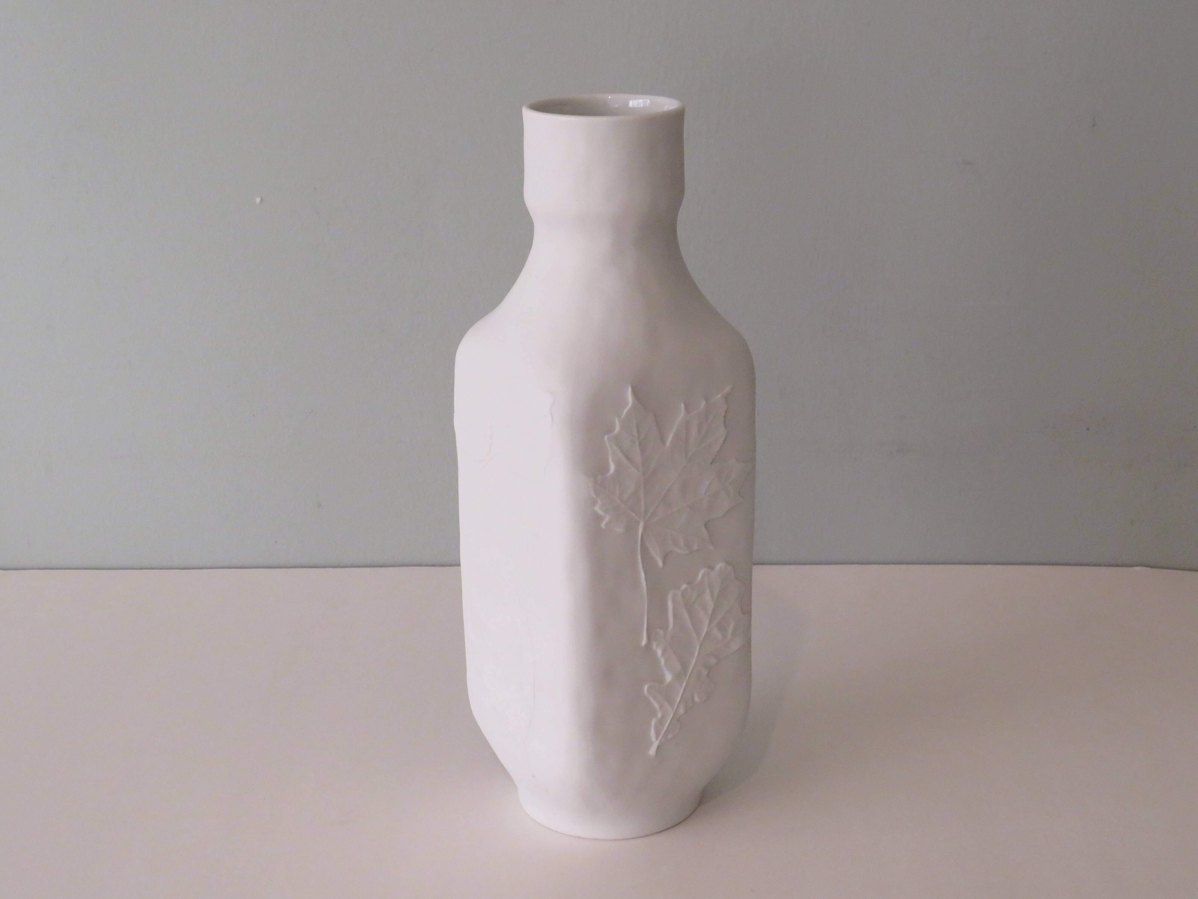 White biscuit vase with floral motif in relief, Hutschenreuther, Germany 1970
