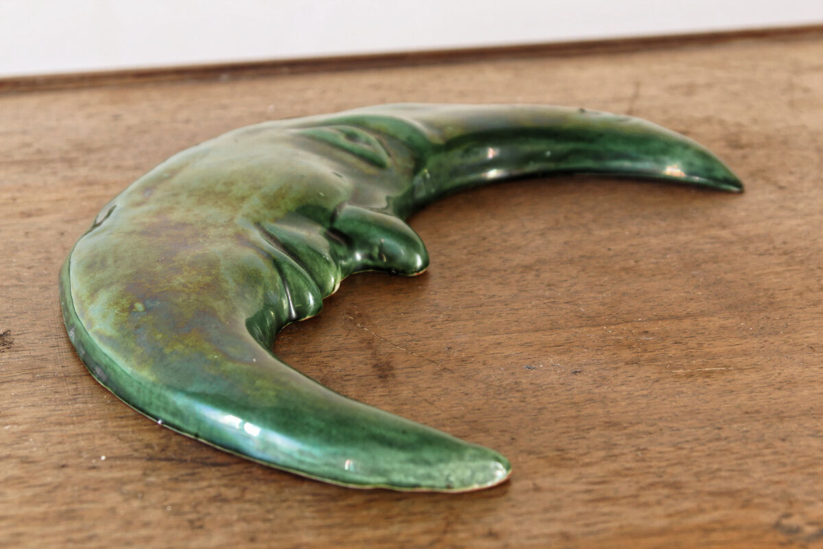 Glazed terracotta moon