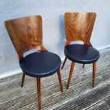 Pair of Dove chairs • Baumann • Black faux leather