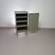 Gray metal locker. Industrial small sideboard.
