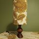 Turned wood lamp with authentic vintage lampshade and mustard flower decoration