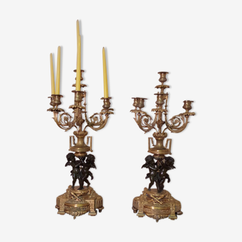 Pair of candelabras with bronze cherubs