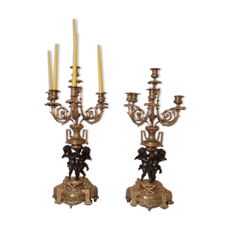 Pair of candelabras with bronze cherubs