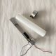 Opaline tube and chrome-plated brass wall lamp