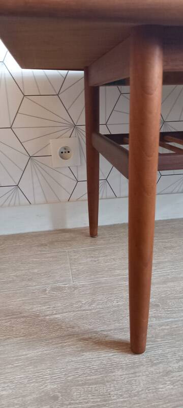 Danish 1960s teak coffee table with slatted shelf.