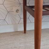 Danish 1960s teak coffee table with slatted shelf.