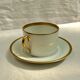Teacup with its white Limoges saucer and fine-sized porcelain gold:H-6.5 D -17