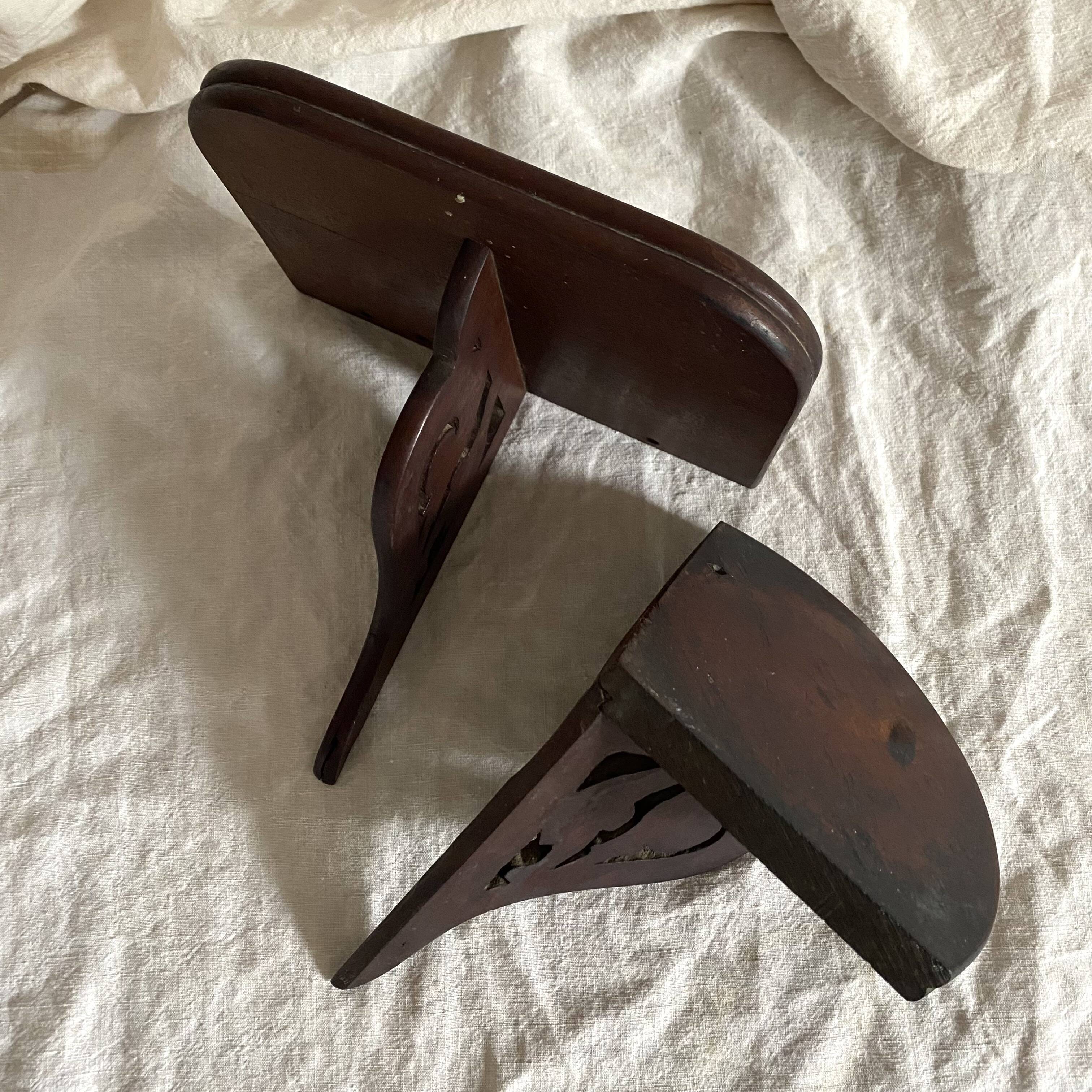 small old openwork wooden wall shelf