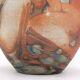 Decorated vase with woman, bathing scene.