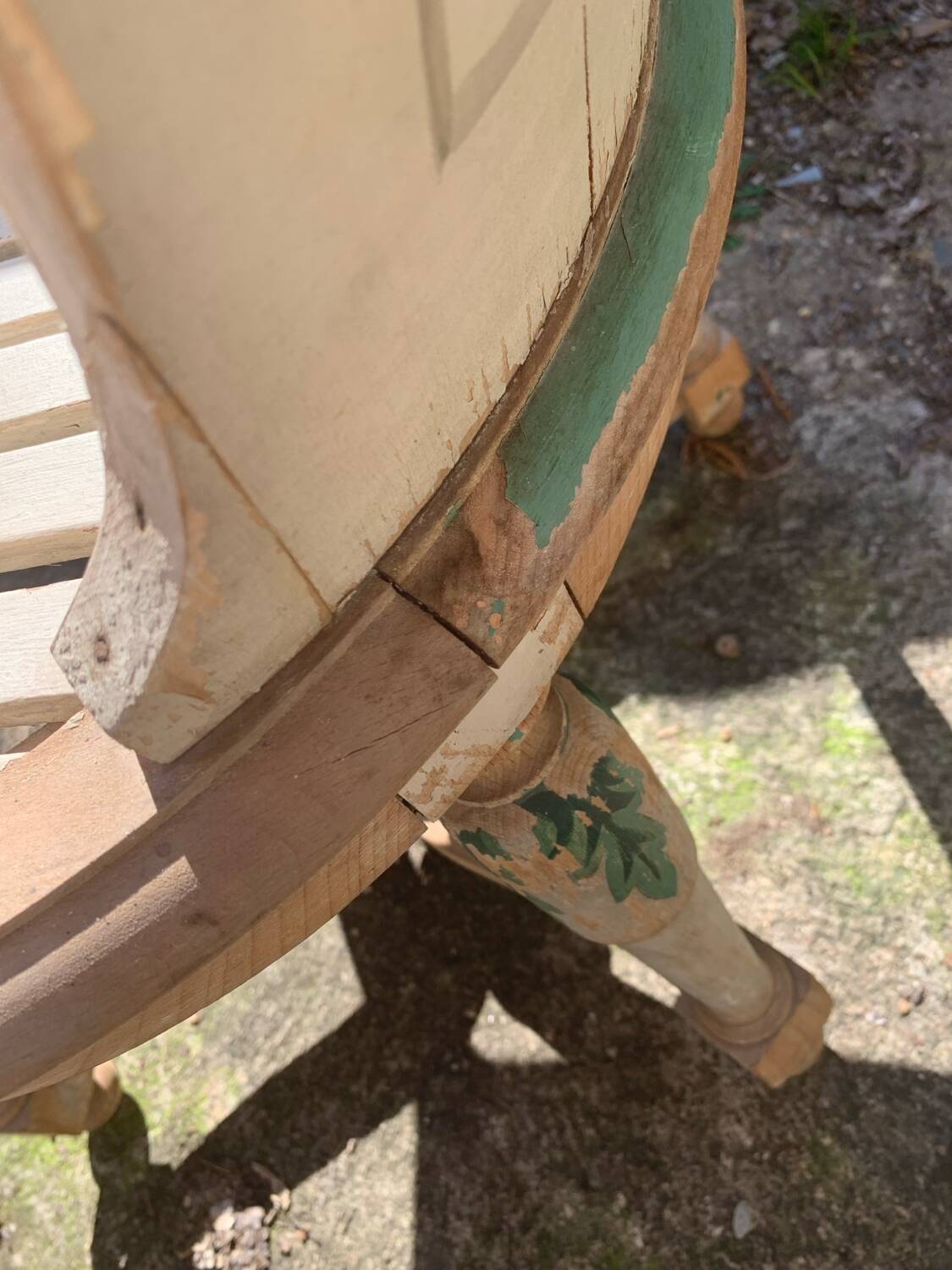 Armchair with painted wooden spacer