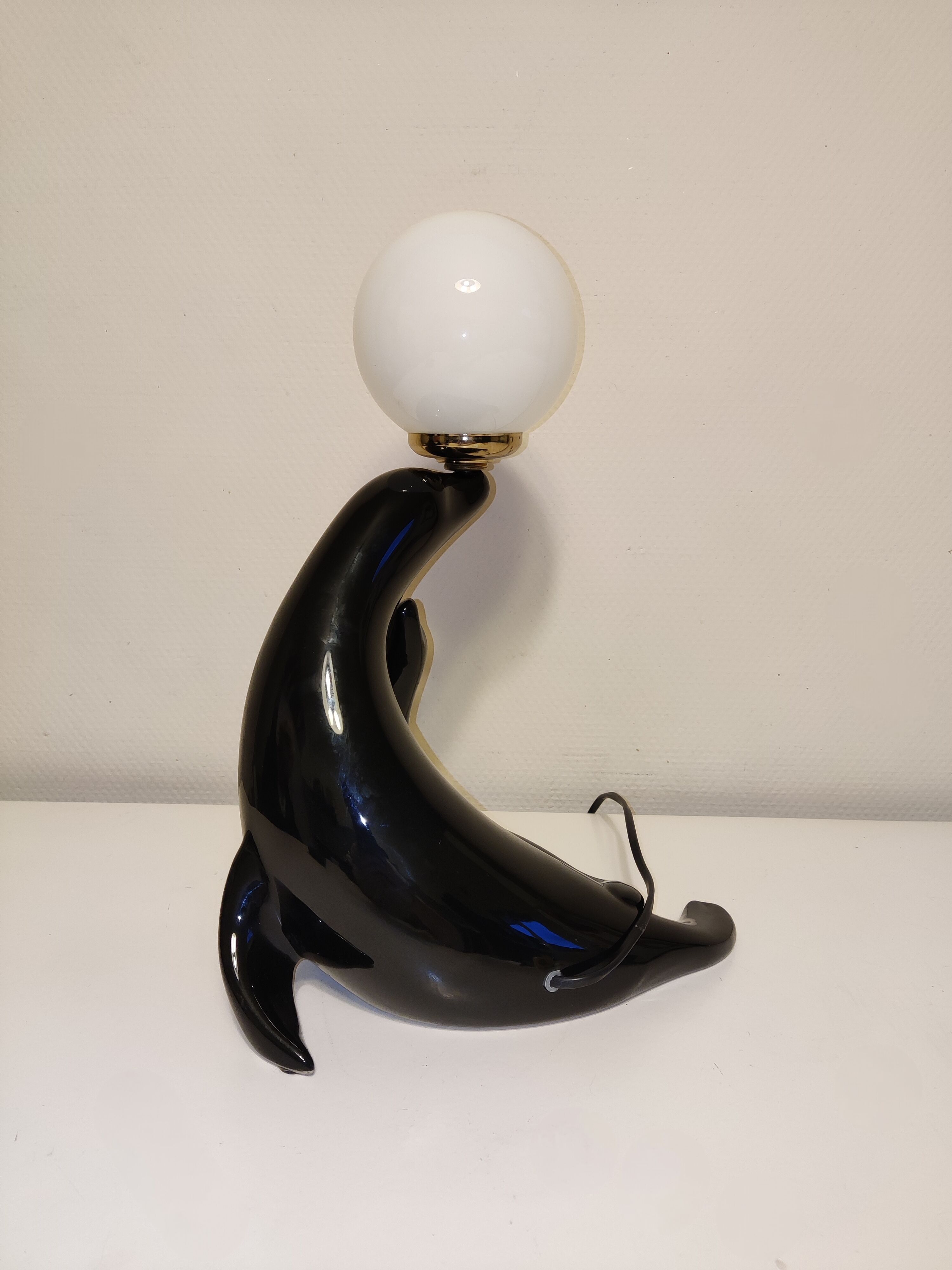 Sea lion lamp with its small ceramic