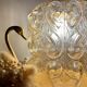 Baladeuse tulipe vintage en verre ambré